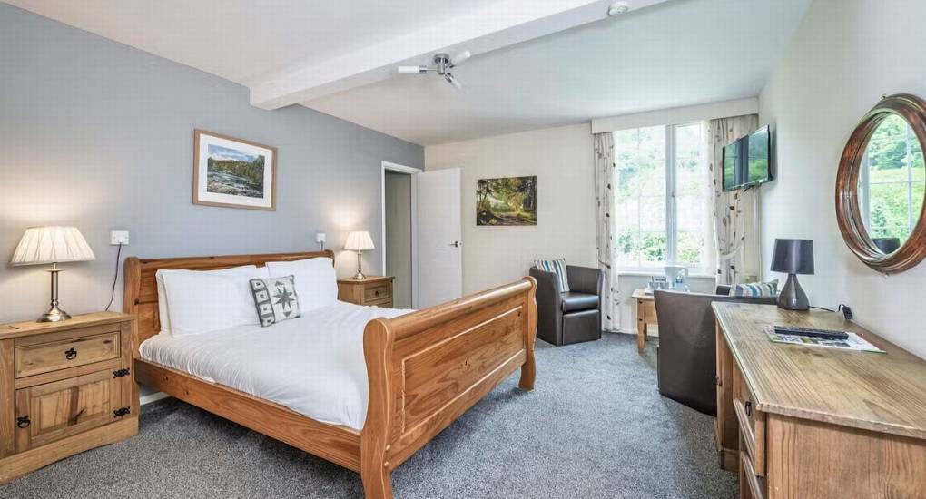A bright and modern double bedroom at River View Lodge, offering comfortable hen weekend accommodation in the Wye Valley.