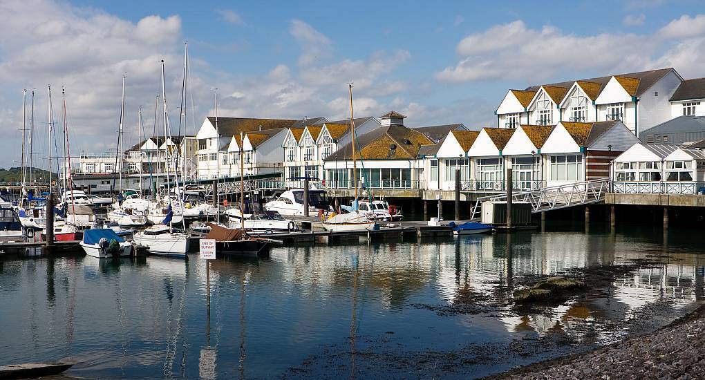Yachts and sailboat masts moored at Ocean Village Marina, scenic waterfront setting for a Southampton hen do.