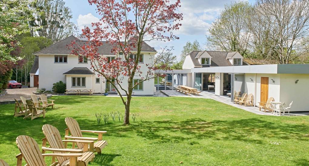 Large private Cotswolds garden at Spa Town, a luxury Cheltenham hen party house with extensive outdoor social spaces.