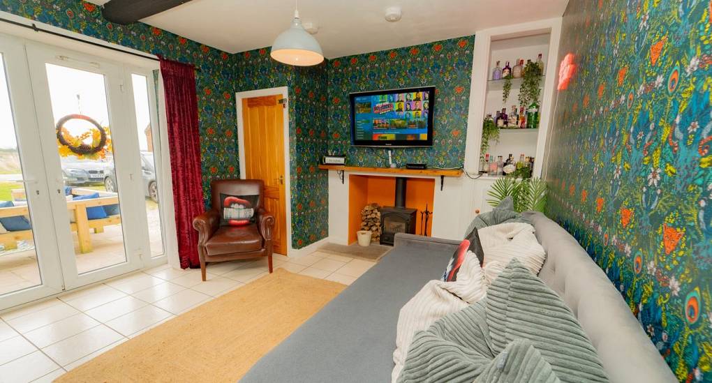 TV room with patio doors