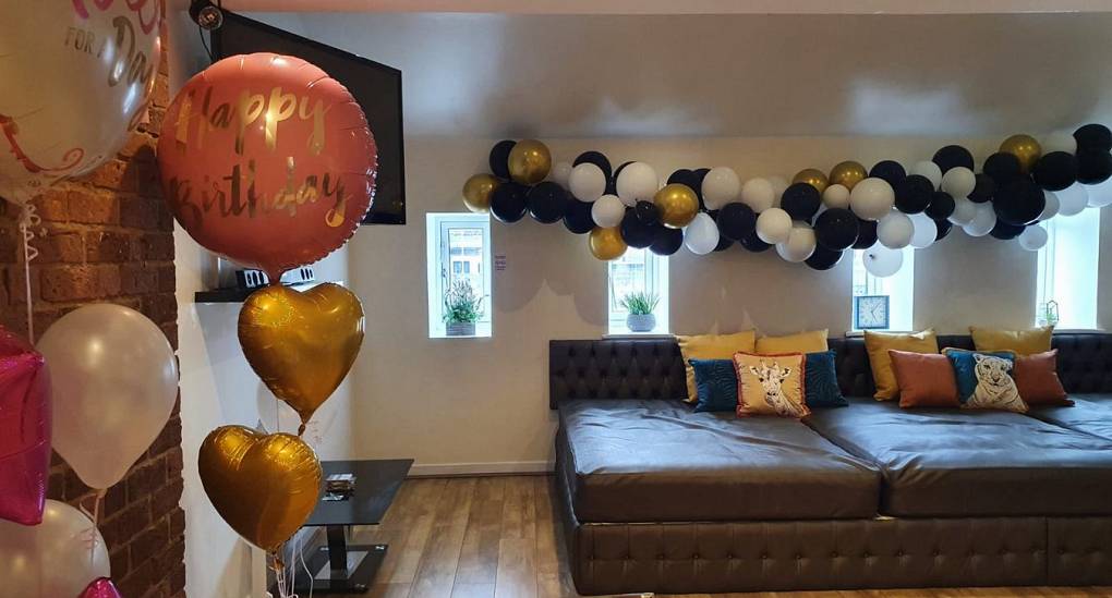 Stag and Hen party home balloons in lounge