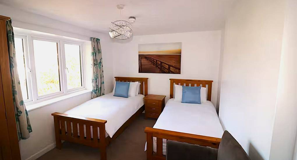 Wooden beds in twin room