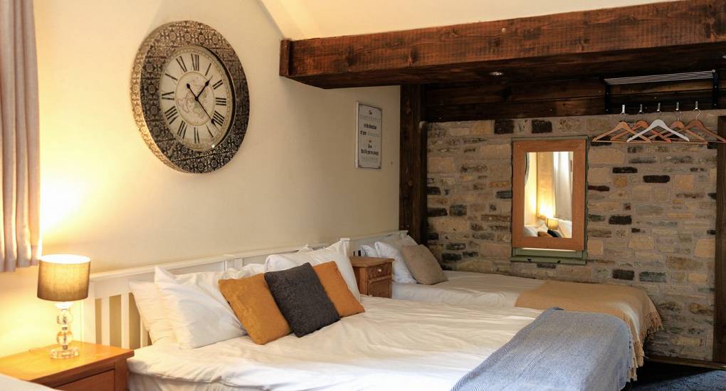 Large clock on the wall in bedroom