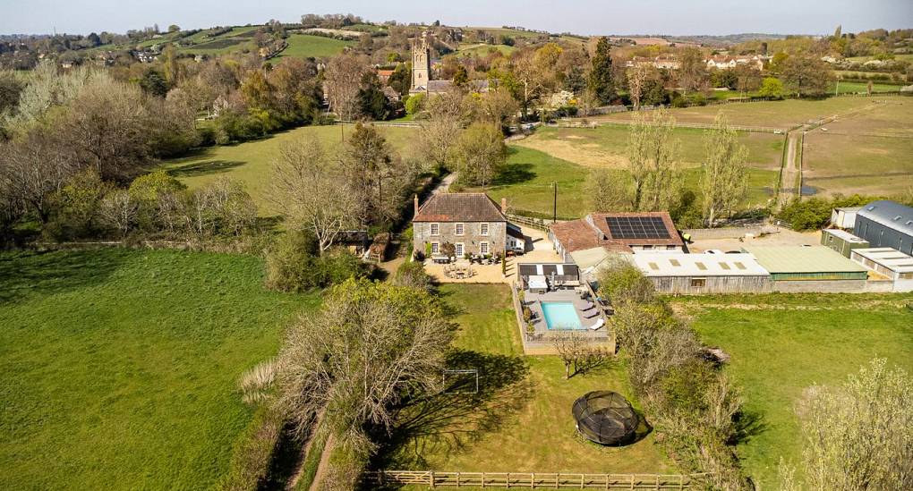 Drone shot of the full house and pool