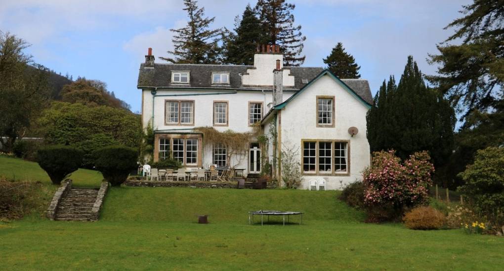 Large garden with house in the background  