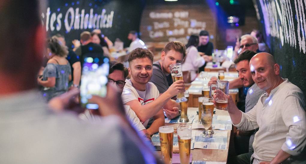 Group of stags share a toast at the Bierkeller