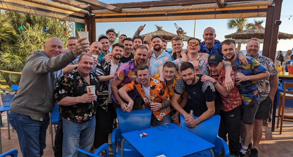 Benidorm stag do pose for a pic