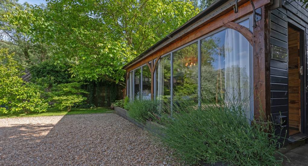 Luxury garden cabins at Summerset House: Private annex accommodation for Bath hen weekends with modern interiors.
