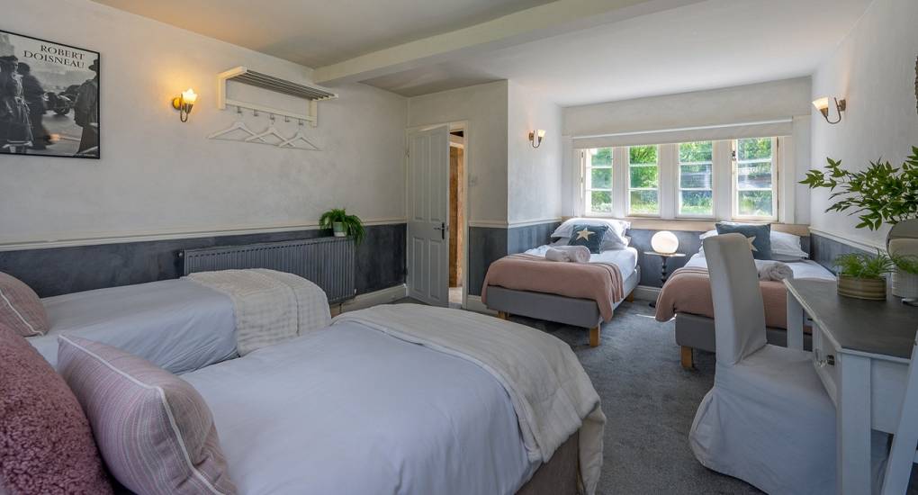 Luxury Bath hen do accommodation: Bedroom 1 at Summerset House featuring a ground floor twin layout with en-suite.