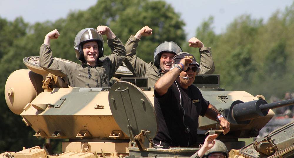 Stag group driving a tank
