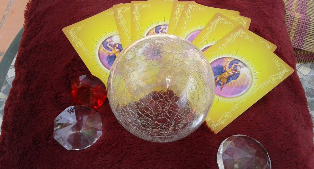 Tarot cards and a crystal ball 