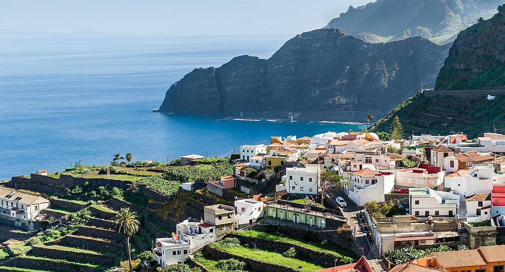 Terraced coastal village and cliffside views overlooking the Atlantic Ocean, island backdrop for a Tenerife stag do.