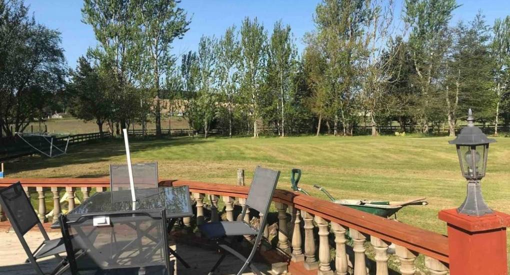 Seating on the patio area overlooking the gardens