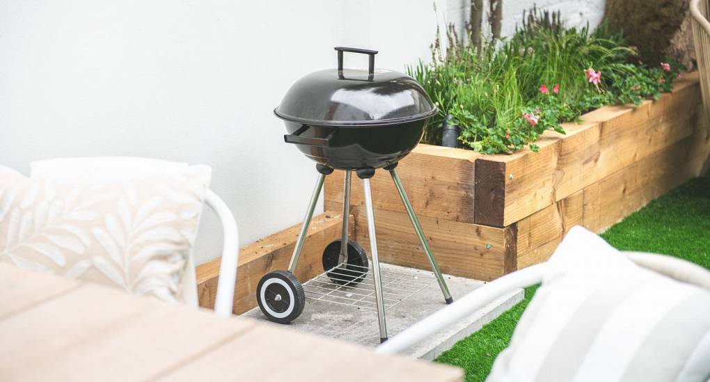 Outdoor BBQ and al fresco dining area at The Drift: A luxury Bournemouth hen party house for groups of 14.