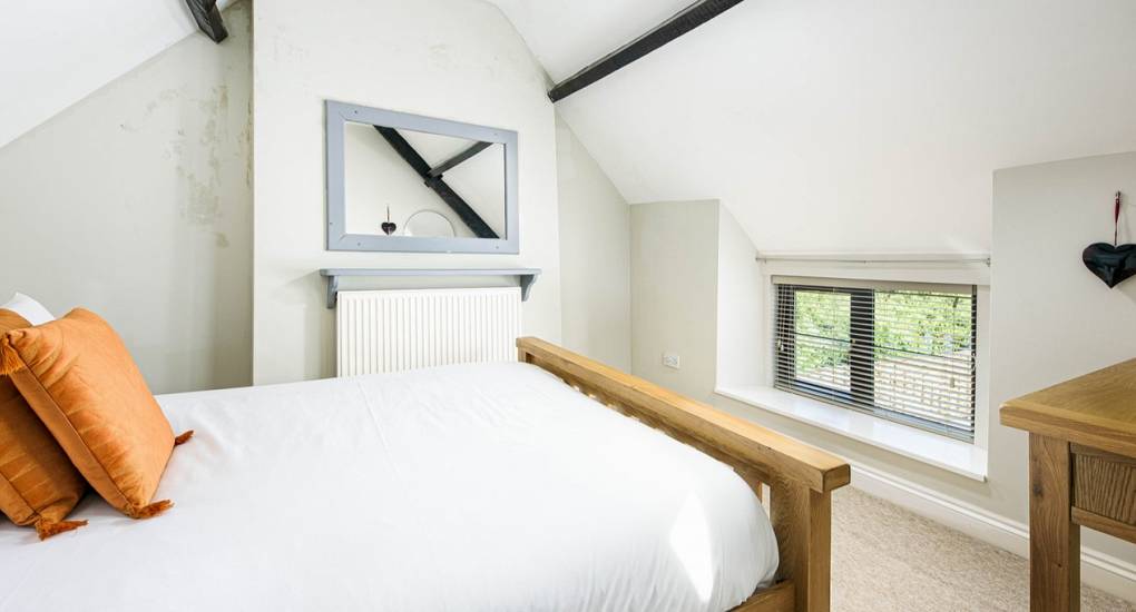 One of the bedrooms in the Farmhouse Bristol Party House