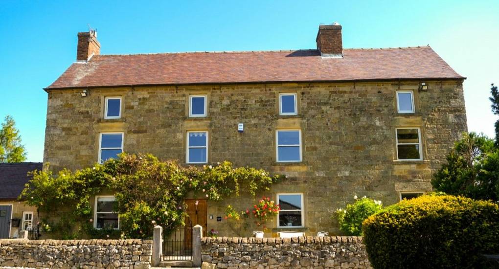 The front of the house. Three Stories sandstone