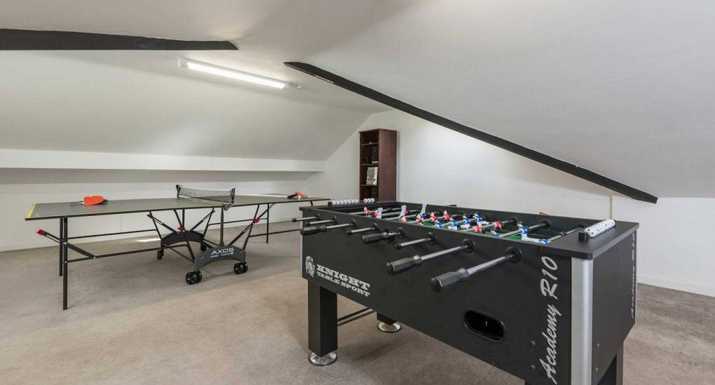 The Games room with Tables Tennis and Football at the Secret Garden New Forest Stag do house