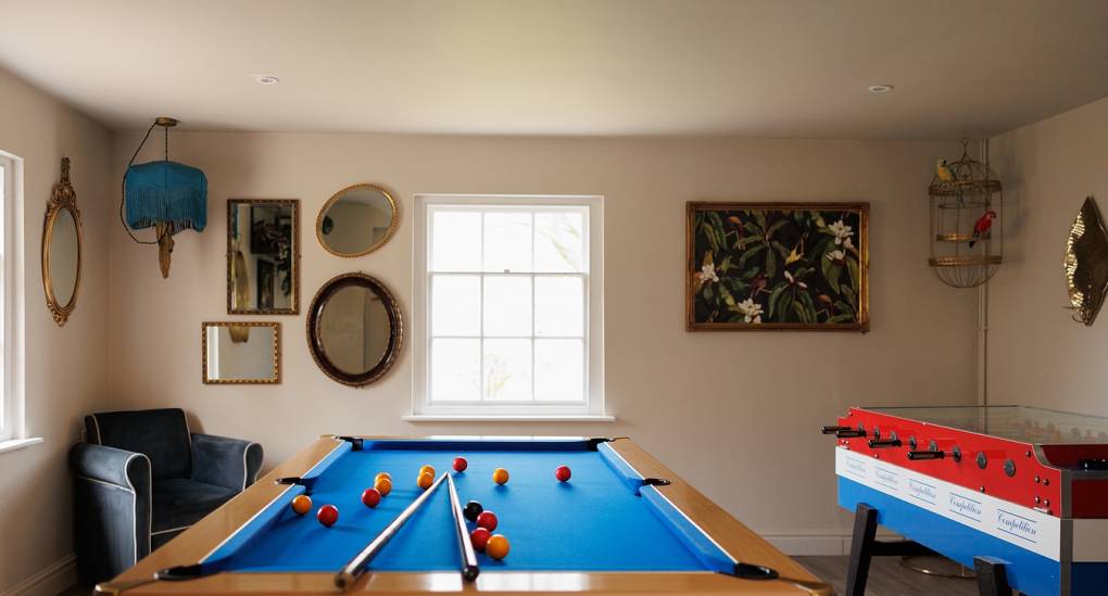 One of two games rooms at the Grand Manor large party house with table football and pool table