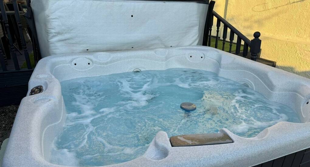 The Hot tub in action with water bubbling