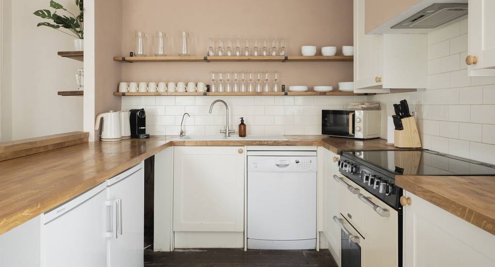 The open plan kitchen area with standard appliances