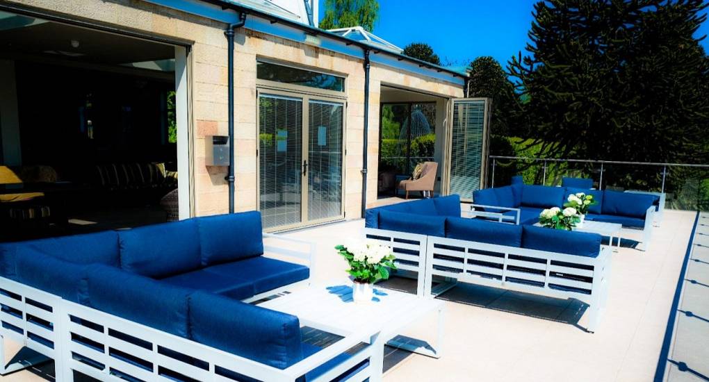 view of the decking in the foreground with the Silver Screen Villa in the background