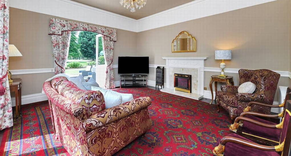 Stunningly decorated second living room with garden access at The Parsonage, a luxury Nottingham hen party house.