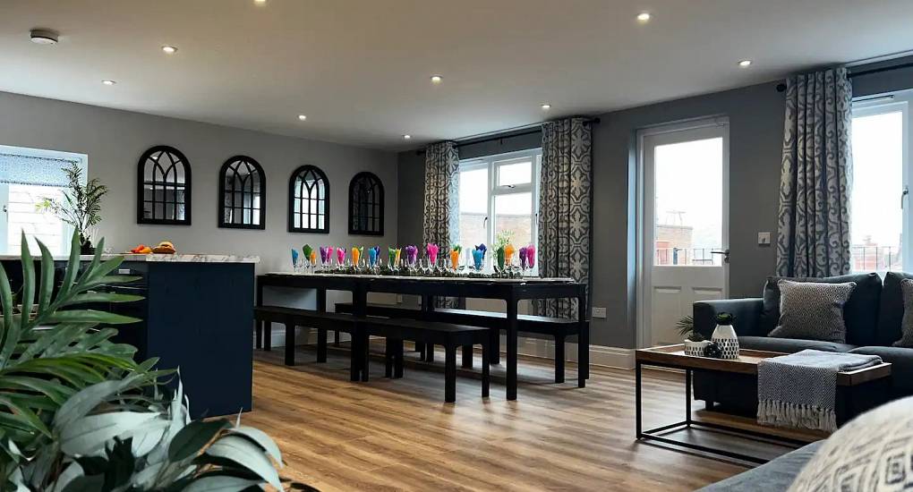 The open plan living and dining area at the Rose Chester Party house