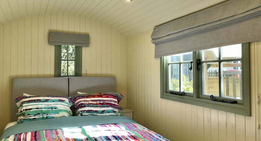 The shepherds huts bedroom at the Secret Garden in the New Forest