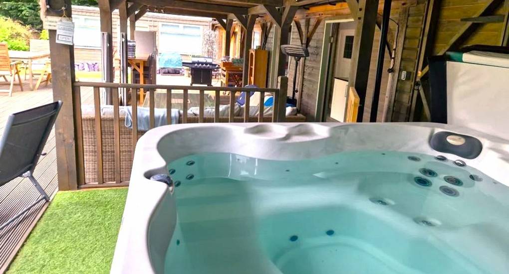 Hot tub at the stables York under cover with a view