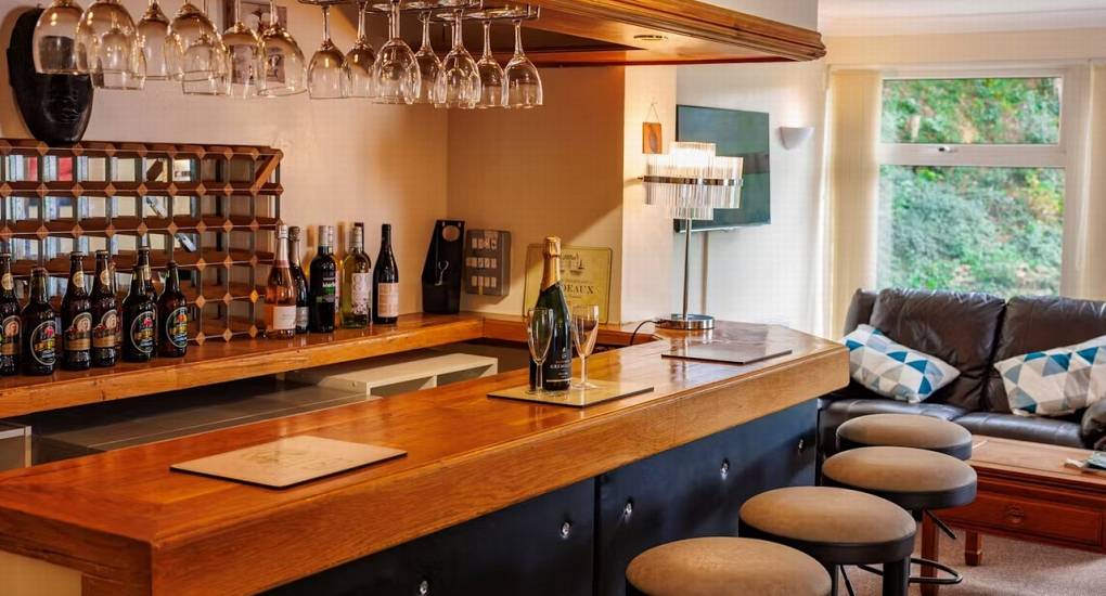 The fantastic private bar at White Horse House, offering a unique feature for your self-catered hen weekend accommodation that sleeps 30 guests in Herefordshire.