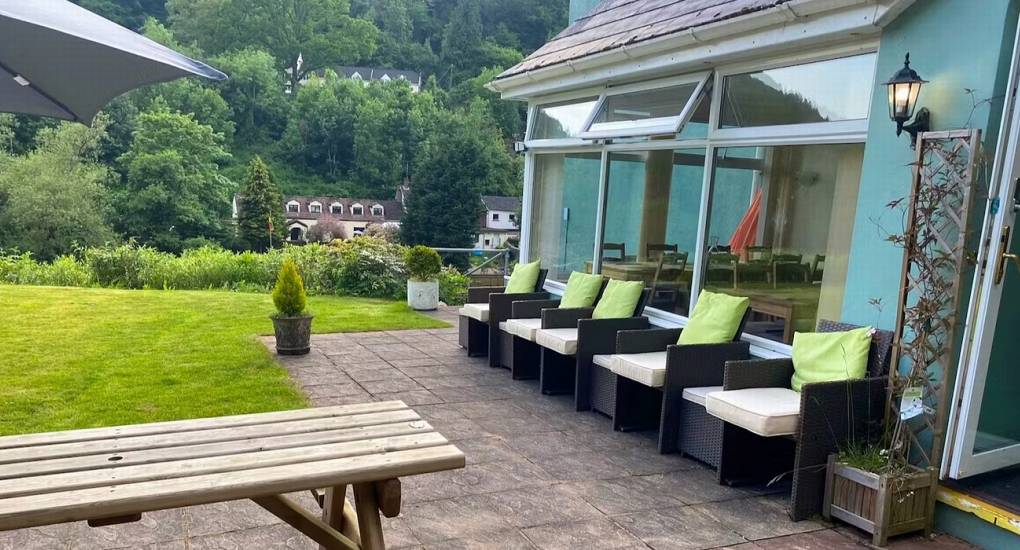 The outdoor patio and seating area at White Horse House, perfect for groups to relax during their Herefordshire hen weekend accommodation for up to 30 guests.