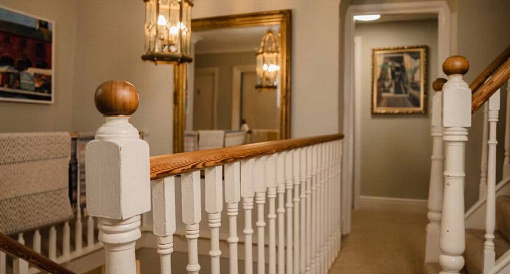 Enjoy the decadent hallway at the Wye House displaying hanging lights.