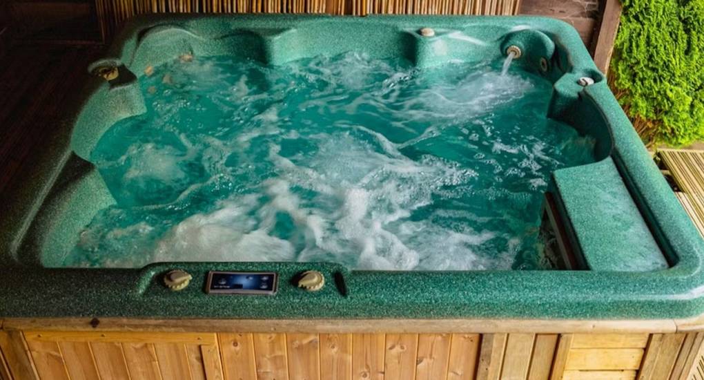 A close-up view of the bubbling hot tub at The Wye House, which is a perfect luxurious feature for a Herefordshire hen party house that sleeps 22.