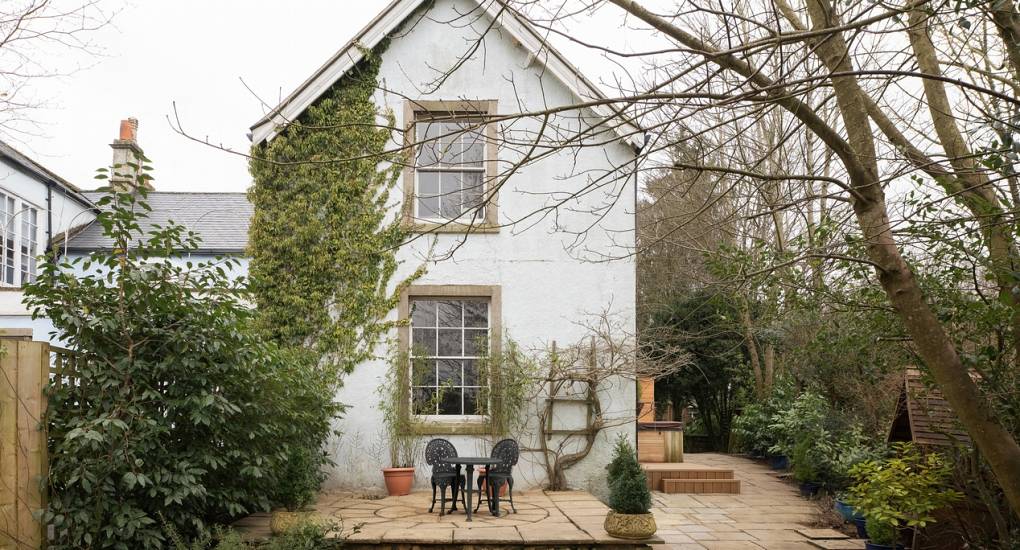 Full picture of the outside of the property during the day