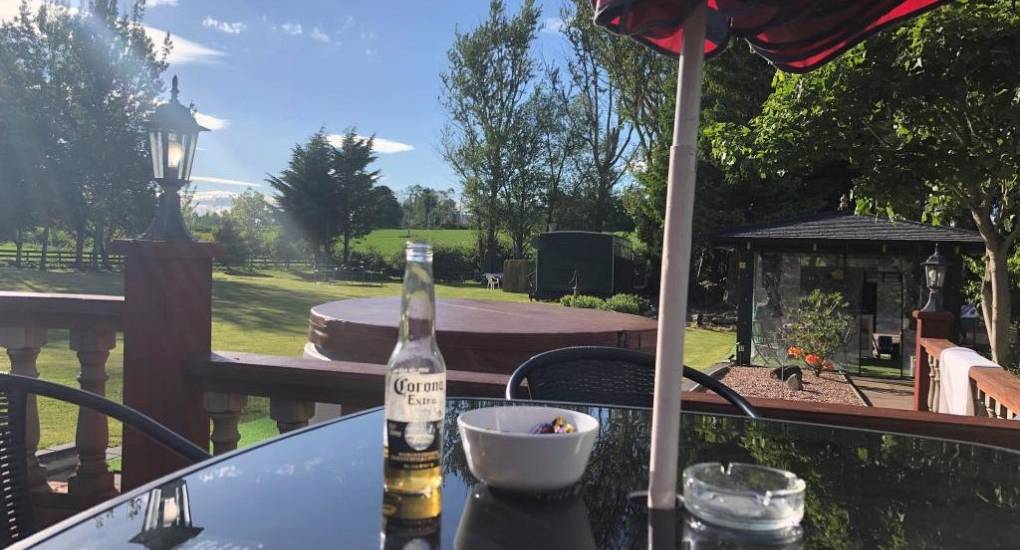 View from the decking area with gardens in the background