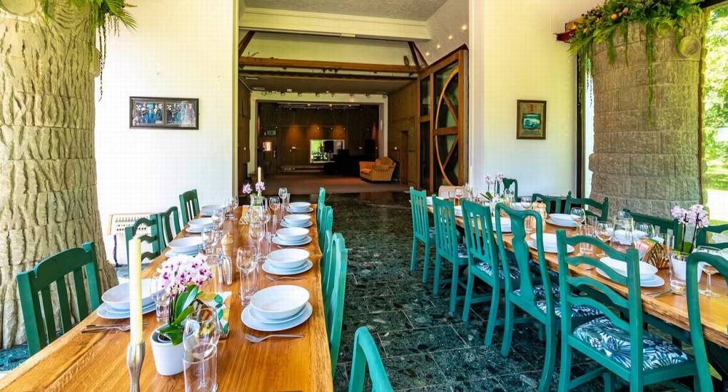 View through the dining room at the luxury Wales hen party house the Musicians Manor