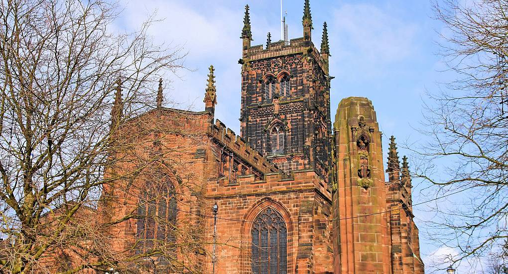 St Peter's Collegiate Church sandstone tower and Gothic architecture, landmark backdrop for a Wolverhampton stag do.