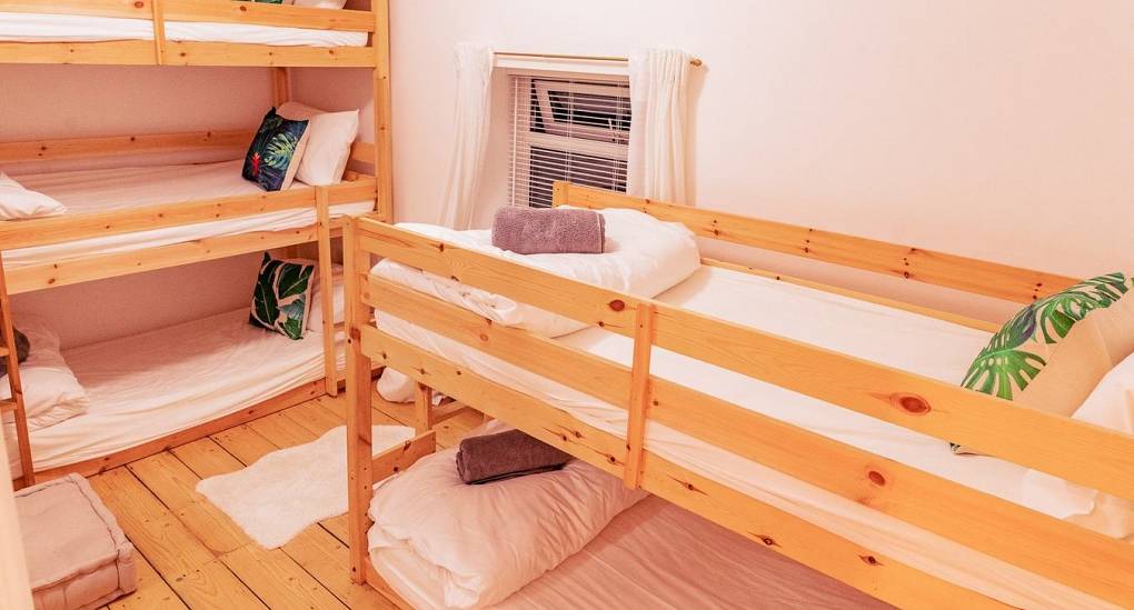 Bedroom with triple bunk and double bunk